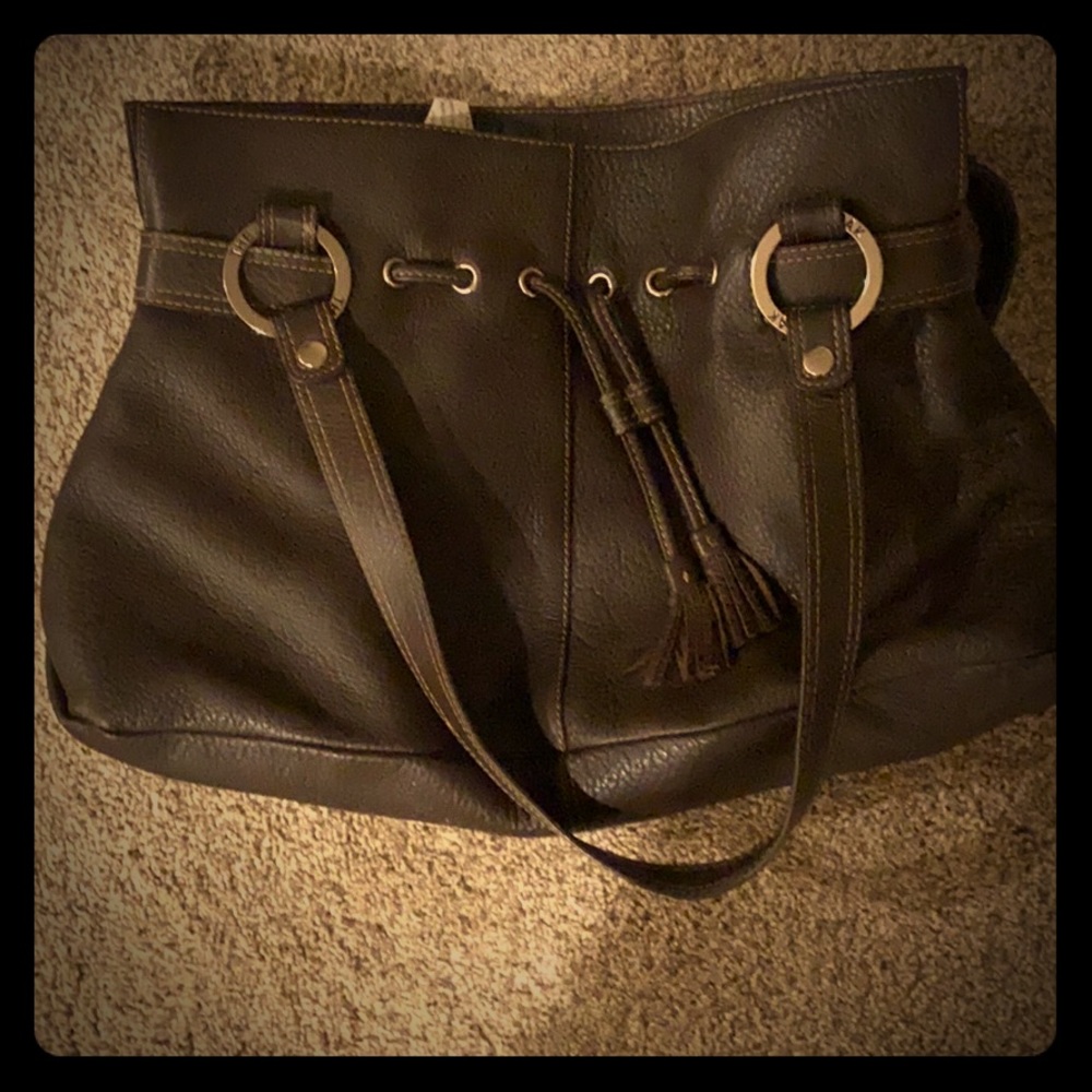 The SAK brown leather “pink label” purse.